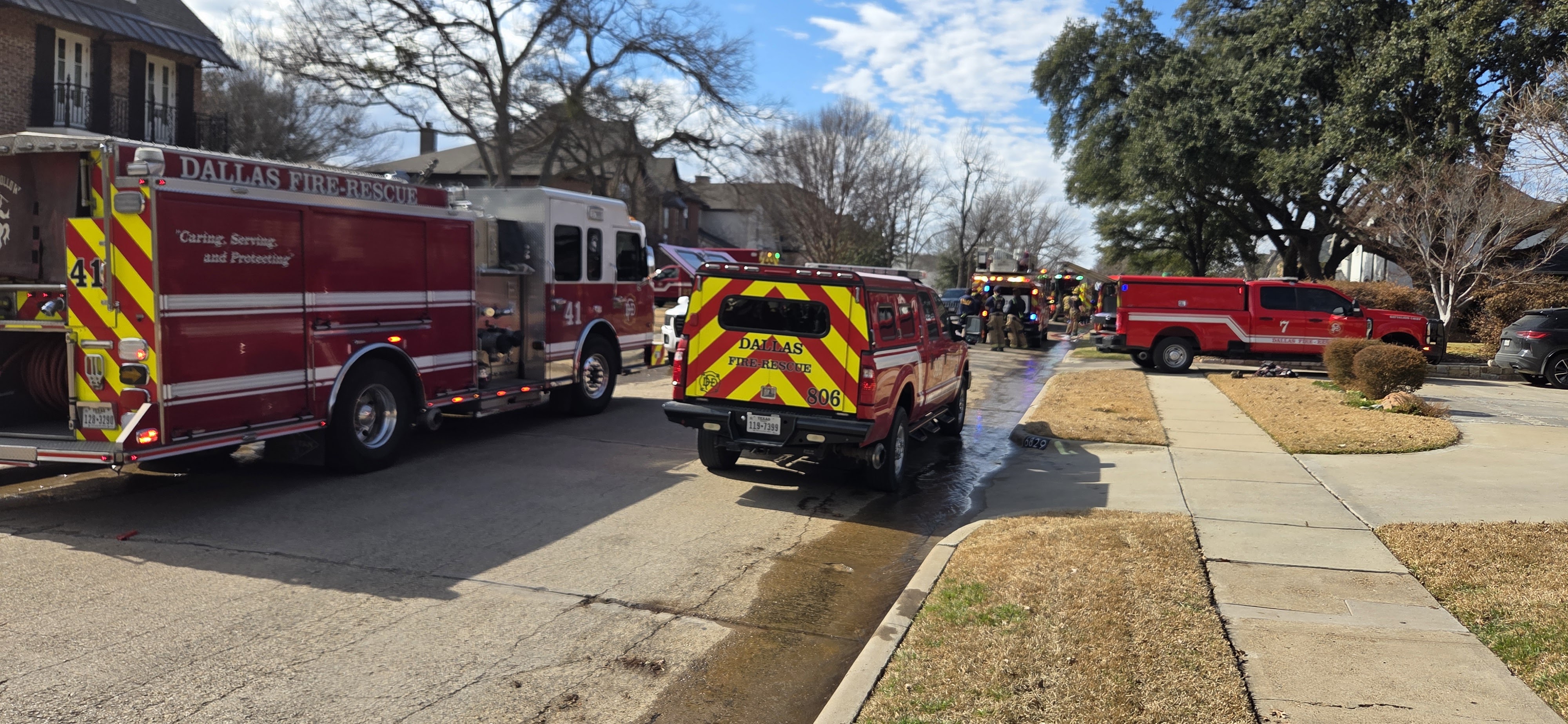 Dallas Fire-Rescue trucks at a supply drive